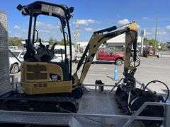 Caterpillar 301.7DCR Mini Excavator, Attachments & Trailer