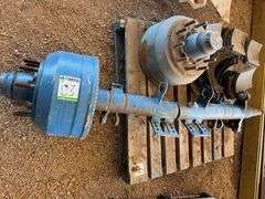 Brake Drums and Parts.  Axle is bent.