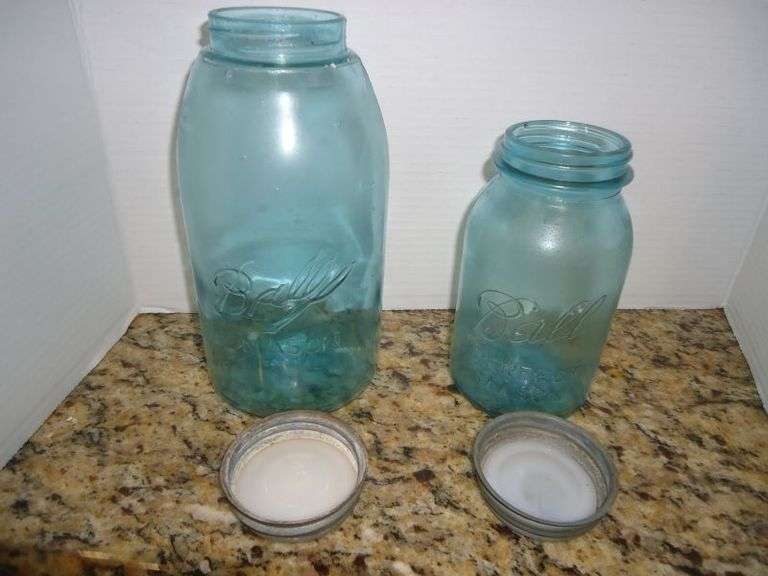 Cash Only.  2 vintage blue Ball Mason jars with lids.  (K)