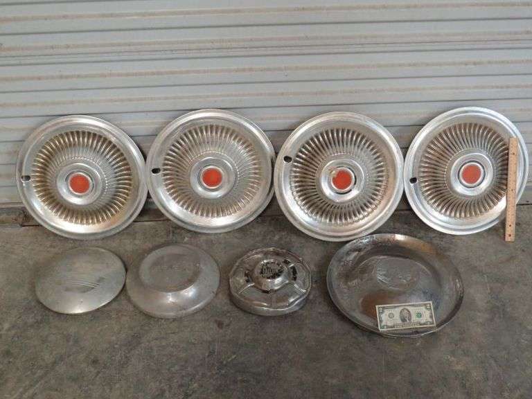 Eight Vintage Hubcaps, four matching, as shown Texas Online Auction House