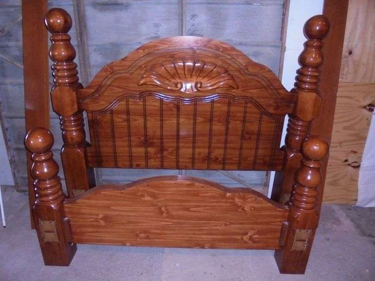 Very Nice Solid Bed.  This bed has both Rail slots for a Full or Queen Size Bed set up.  Headboard measures 63.5 wide x 58 tall.