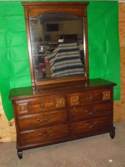 Solid Wood 6 Drawer Dresser w / Mirror.  Drawers are all dovetailed, Clean, and operate as they should!  52 x 17.5 x 31 tall Dresser and a 33 wide x 42 tall mirror.