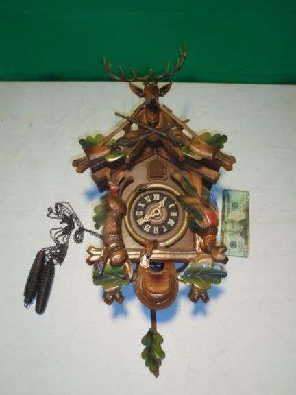 Cuckoo Clock.  Needs a piece glued back on but comes w/ the clock.