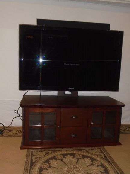 Large SAMSUNG 54" TV, Swivel TV Mount w / Console TV Stand ( 48 x 21 x 20 tall ).  Also includes a 36" VIZIO Sound Bar and SAMSUNG Blu-Ray Player w/ Remotes.  This is the exact working set up that was at the house.  $$$