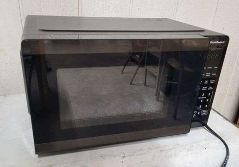 Clean Hamilton Beach Microwave . ( see extra image for interior).  ~ cash only ~. ( 6B)