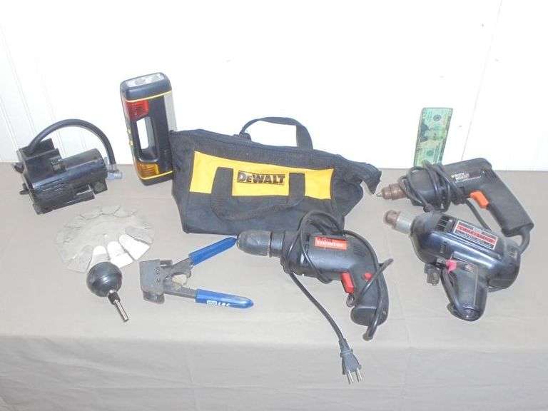 Tool lot including 3 working drills and a DEWALT bag. Texas Online