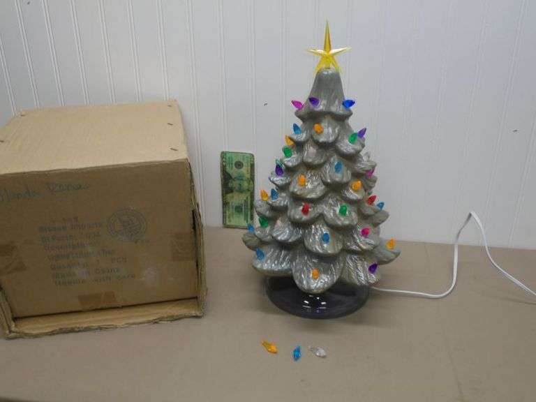 16" Ceramic Lighted Christmas Tree. Works and has all of the pcs. Has