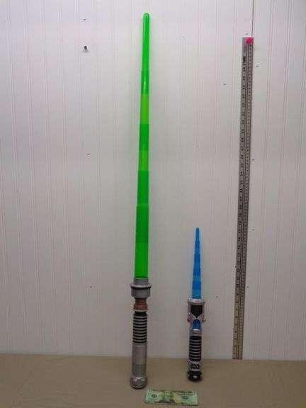2 Star Wars Light Sabers.