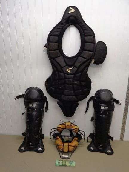 Catchers outfit, mask, leg guards and vest.