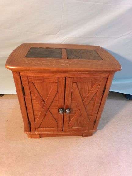 Wooden end table matching lot 006. Finish on top peeling but table is in good condition - 26x18x25.5"