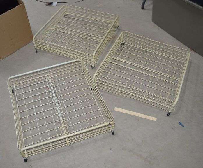 ROLLING UNDER-THE-BED STORAGE BASKETS. ONE OF THE BASKETS IS MISSING 1 WHEEL