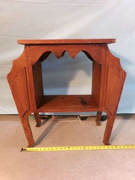 Antique wooden end table w/ magazine racks. In great condition - 26x11.5x26"