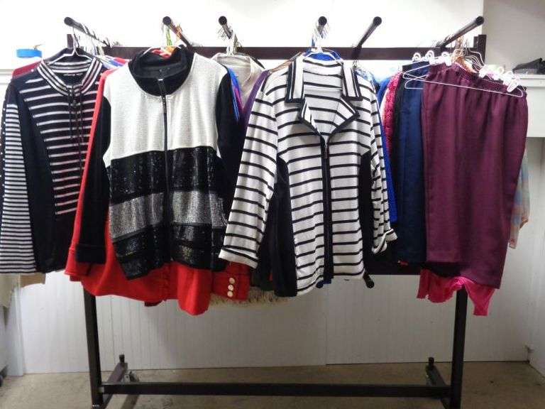 Big lot of Ladies clothes, rack not included.