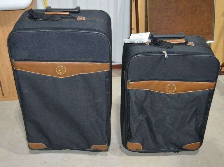 SET OF COMPASS SUITCASES