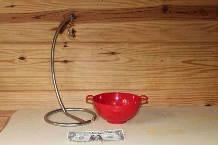 Stainless Steel Banana Hanger and Small Red Collander.  R413