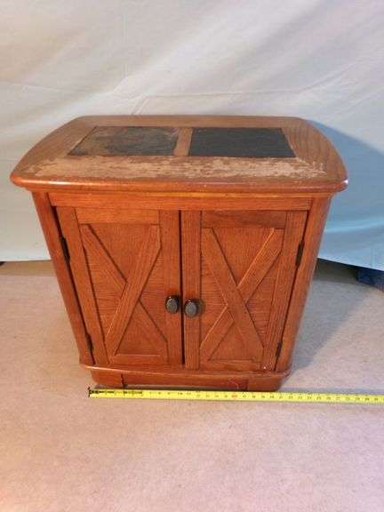 Wooden end table matching lot 006. Finish on top peeling but table is in good condition - 26x18x25.5"