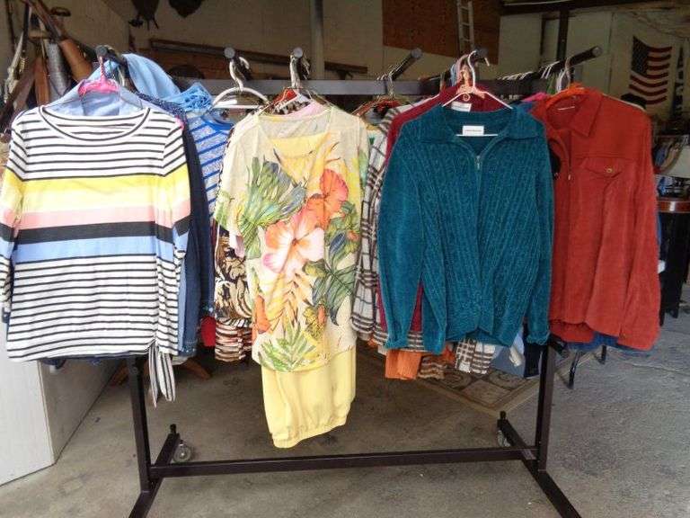 Big lot of Ladies shirts and jackets, rack not included.