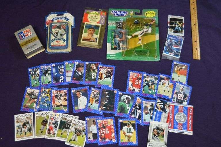 ASSORTED SPORTS CARDS & COLLECTABLE FIGURE