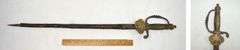 POSSIBLY A PRE-WAR MILITARY COURT SWORD OR DRESS SWORD, POSSIBLY PERSIAN??? THE HILT IS A LION HOLDING A SWORD. PLEASE COME PREVIEW