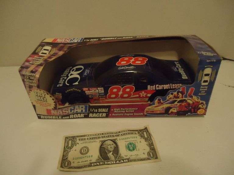 CASH ONLY  Dale Jarrett Nascar 1/18 scale car, "Rumble and Roar" Racer, needs batteries. (U)