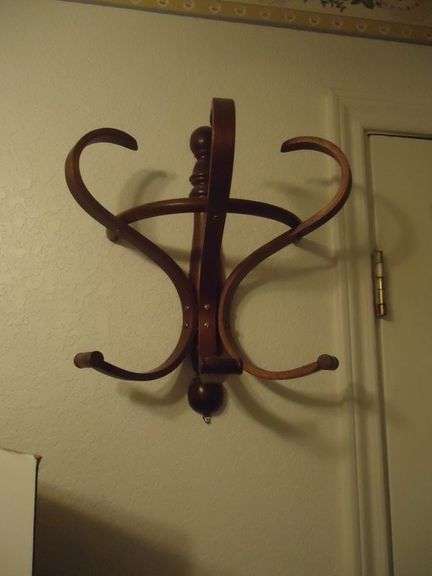 CASH ONLY  Wooden hat rack on wall. (U)