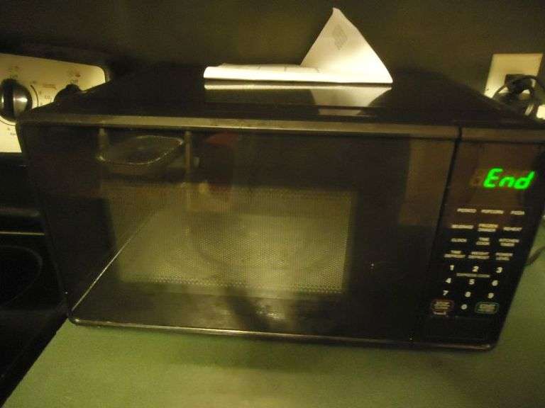 CASH ONLY Working Main Stays Microwave. (K)