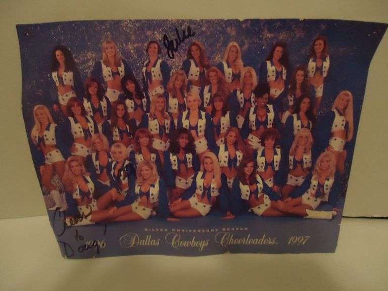CASH ONLY  1997 Dallas Cowboys Silver Anniversary Cheerleaders, autographed photo. Signed by Julie Cash, 8 1/2" x 11".  (U)