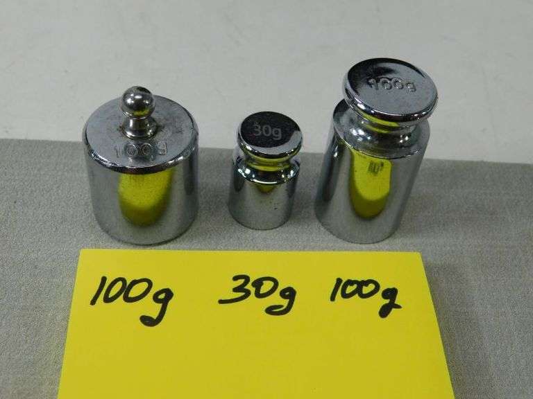 100g/30g/100g weights for scale