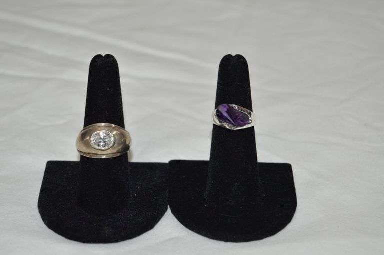 CLEAR STONE IS SIZE 8.5-9 & PURPLE STONE IS SIZE 5.5-6. BOTH ARE MARKED 925