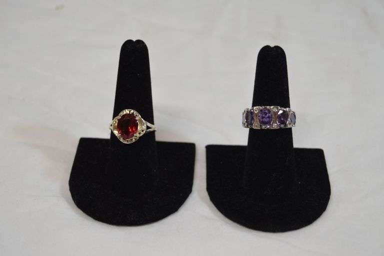 RED STONE RING, SIZE 8.5-9 & PURPLE & CLEAR STONE RING. SIZE 7-7.5. BOTH MARKED 925