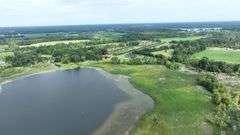 Tract 1: 93+/- Ac., House, Hangar & Runway