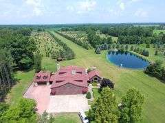 Tract 1: 93+/- Ac., House, Hangar & Runway
