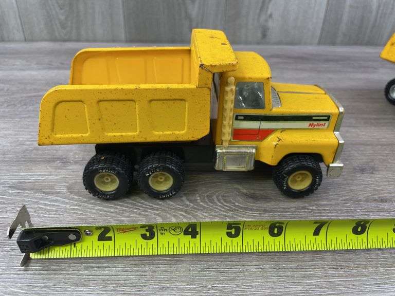 2 Nylint & 1 Mighty Wheels Dump Trucks