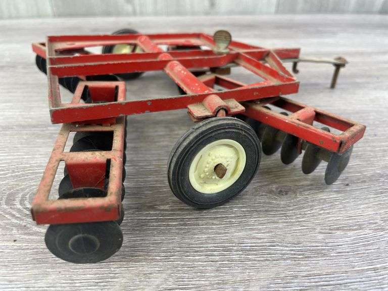 International Disc, 1/16, Ertl, Has Been Repaired