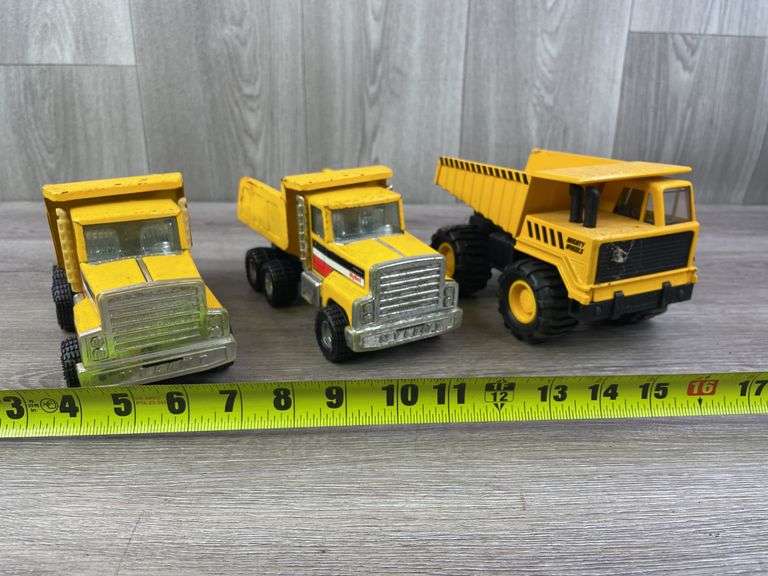2 Nylint & 1 Mighty Wheels Dump Trucks