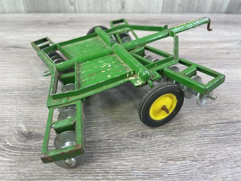 2 John Deere Discs, 1/16, Ertl, 1 Has Been Customized