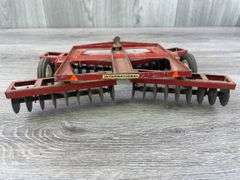 International Disc, 1/16, Ertl, Has Been Repaired