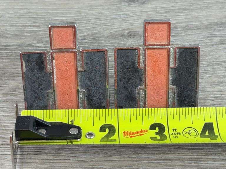 2 IH Emblems, 1 3/4”Wx2”H, 1 Has Broken Mount