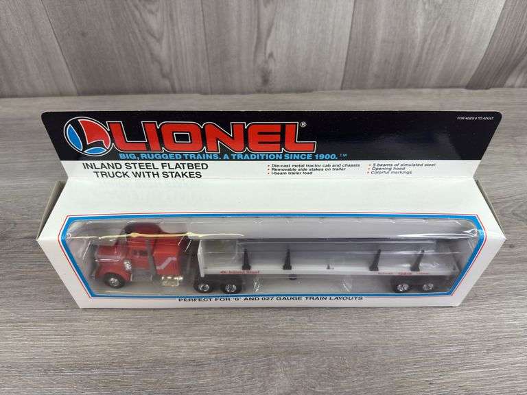 Lionel Inland Steel Flatbed Truck W/Stakes, 11 1/2” Long