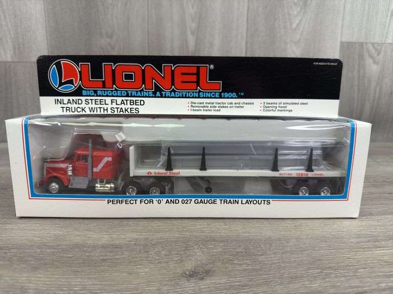 Lionel Inland Steel Flatbed Truck W/Stakes, 11 1/2” Long