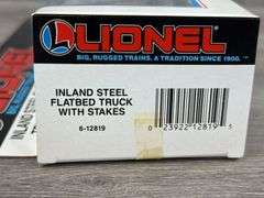 Lionel Inland Steel Flatbed Truck W/Stakes, 11 1/2” Long