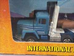 International Paystar 5000 Logger Trailer, 1/64, Ertl, Trucks & Miniatures Of The World