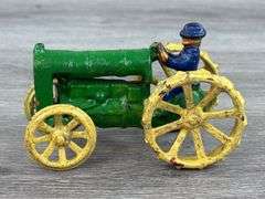 Arcade Cast Iron Tractor W/Cast In Driver, 4 1/2” Long