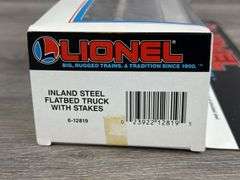 Lionel Inland Steel Flatbed Truck W/Stakes, 11 1/2” Long