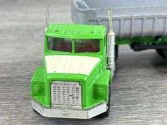 Caterpillar Kenworth T600A Tractor, International Tractor & Dump Trailer
