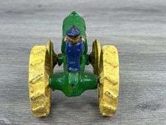Arcade Cast Iron Tractor W/Cast In Driver, 4 1/2” Long