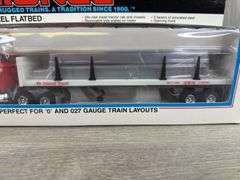 Lionel Inland Steel Flatbed Truck W/Stakes, 11 1/2” Long