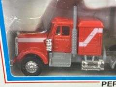 Lionel Inland Steel Flatbed Truck W/Stakes, 11 1/2” Long