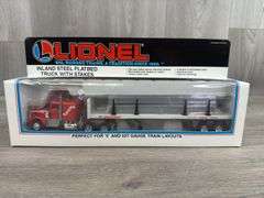 Lionel Inland Steel Flatbed Truck W/Stakes, 11 1/2” Long