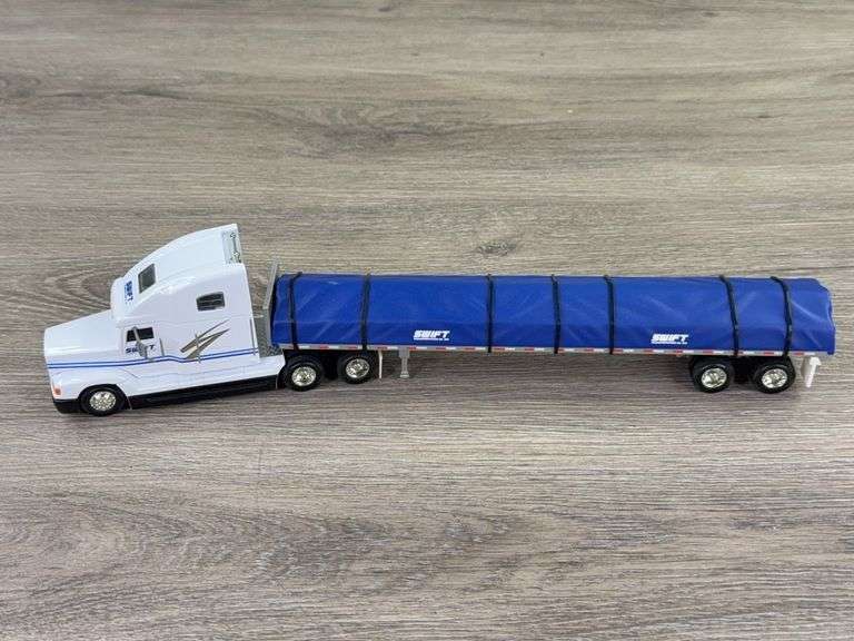 Freightliner FLD 120 Swift Tractor W/Flatbed Trailer, 1/64, PEM